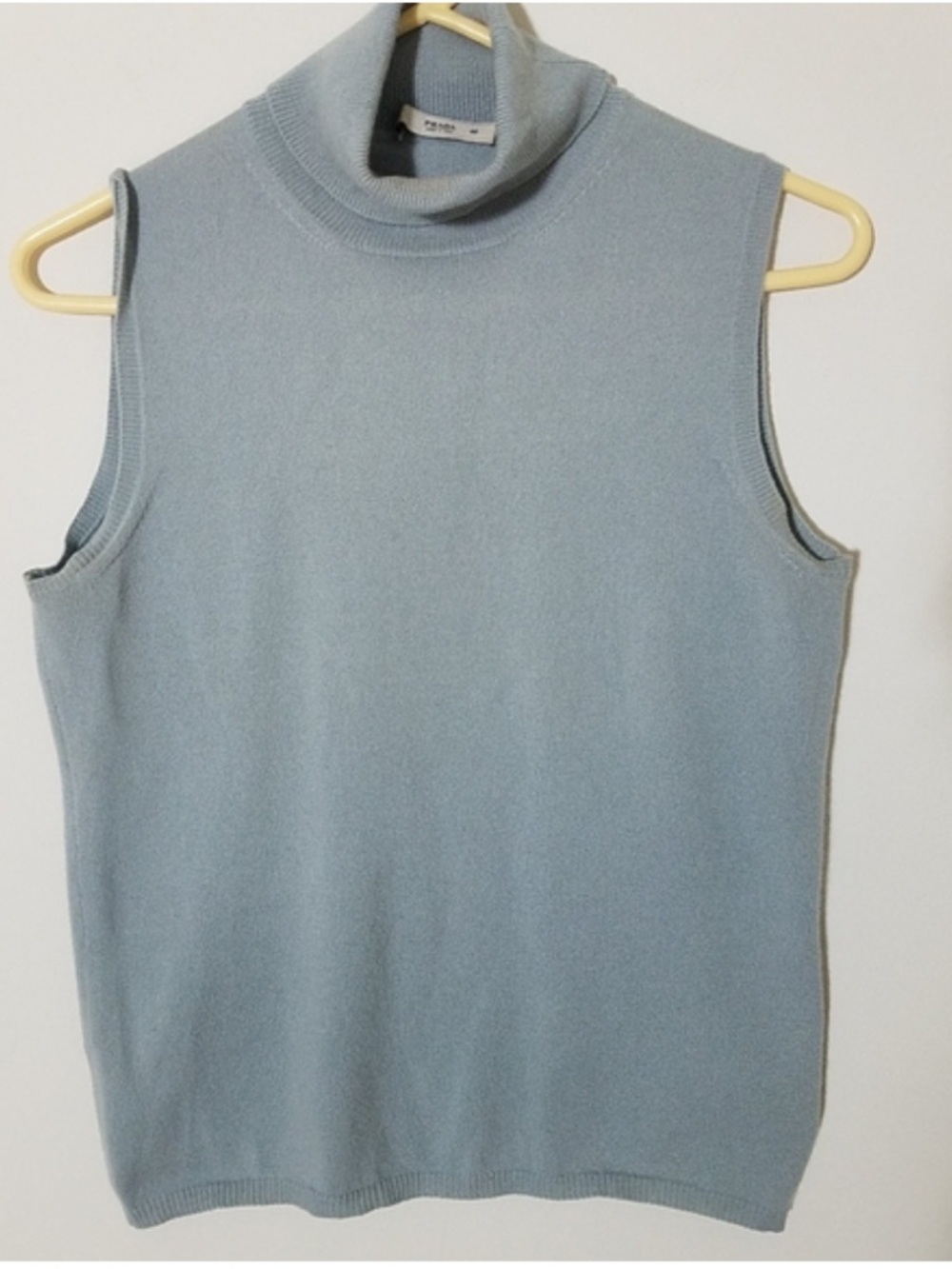 Madeline Light Sage Sleeveless Turtleneck chic minimalist Knit Top